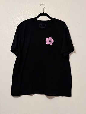 Return to sender Black Tee with Pink Floral Chest Graphic 0057